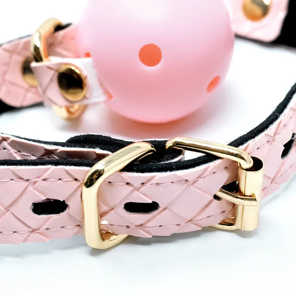 Deluxe Fetish – Braided Pink & Gold Ball Gag